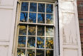 Reflection in old window #092